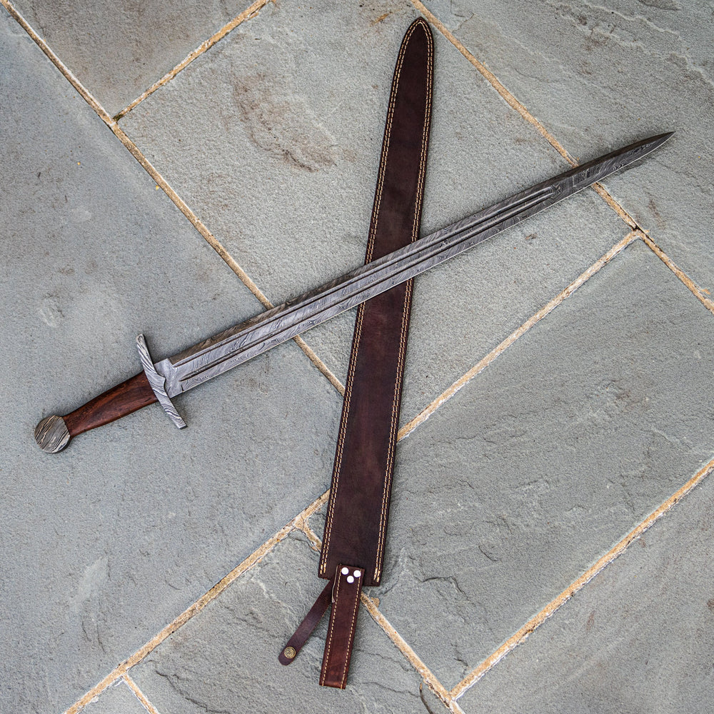 Hand-forged arming sword with cross guard and wheel pommel